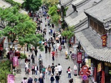 国际锐评｜“五一”假期的人气见证中国经济的底气
