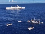 China Coast Guard vessel helps rescue a Philippine fishing boat in distress near Huangyan Dao
