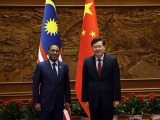 秦刚同马来西亚外长赞比里举行会谈